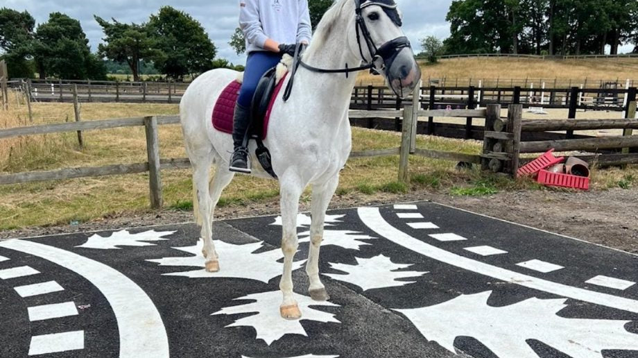 Riders prepare for new road design with innovative painted piece of tarmac