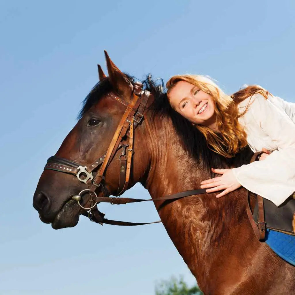 woman hugging a horse - just horse riders