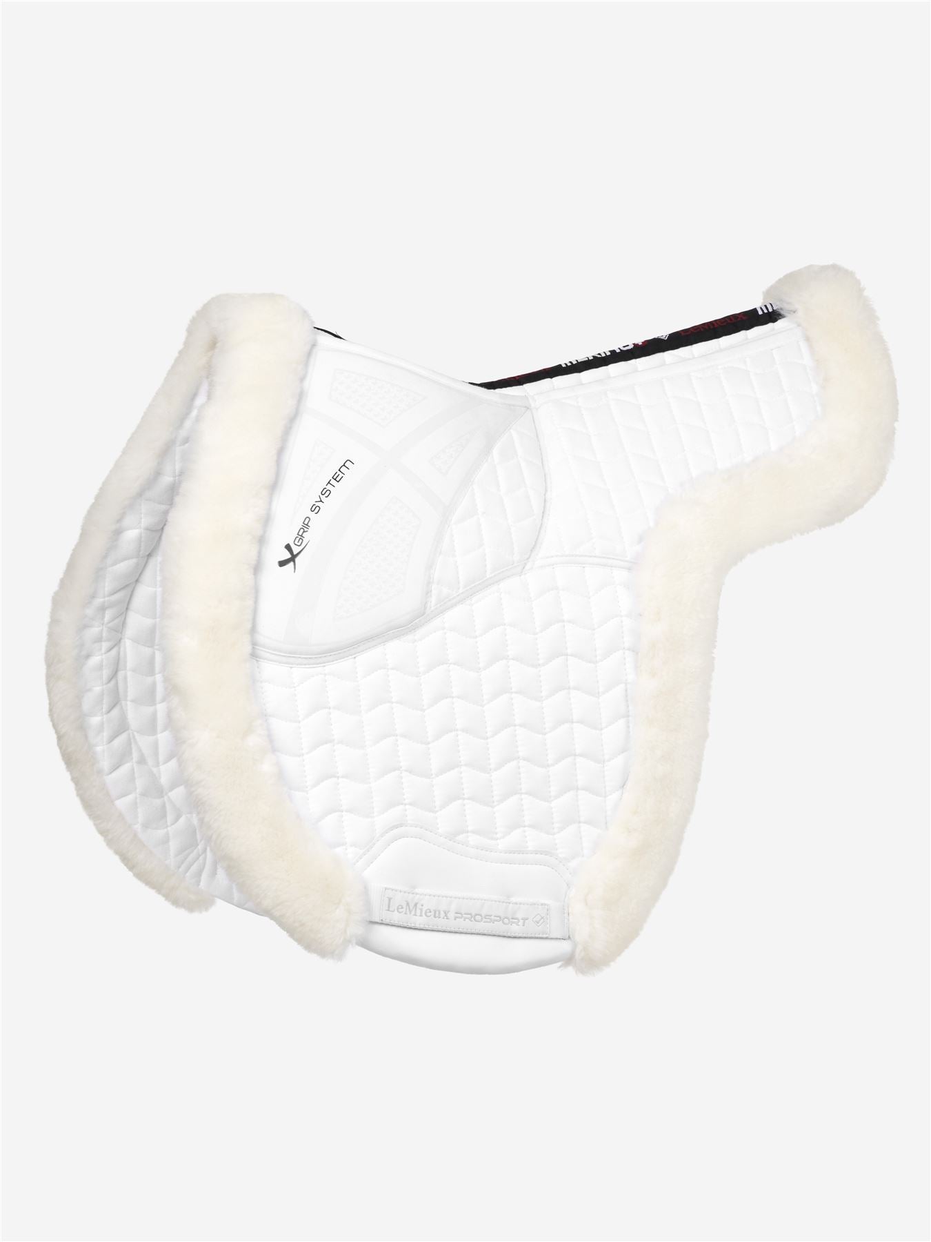 White quilted saddle pad with cream sheepskin lining and rolled trim
