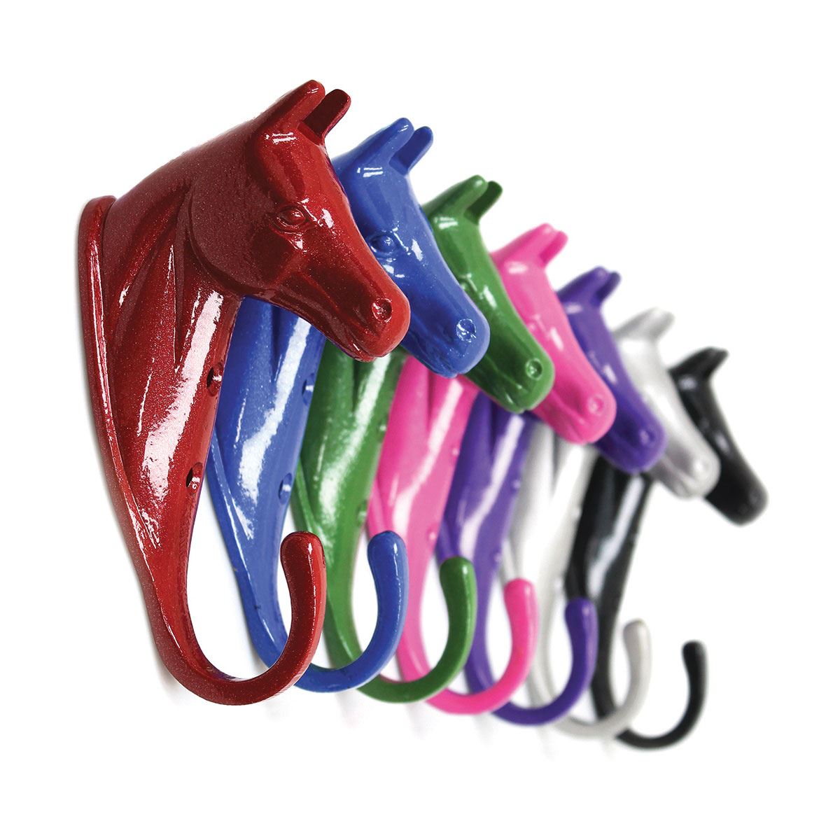 Row of glossy horse-head shaped stable wall hooks in red, blue, green, pink, purple, white and black