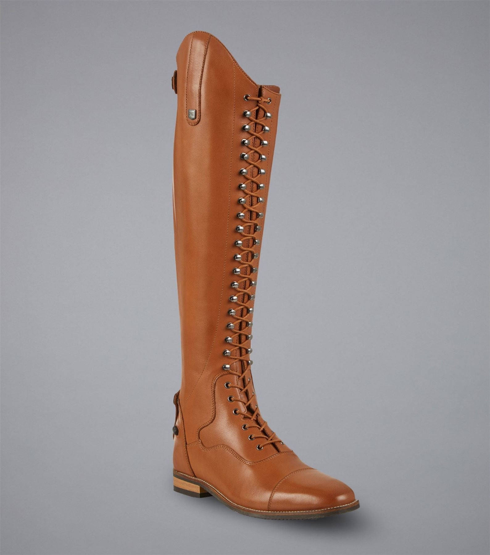Tan leather lace-front tall riding boot on a grey background